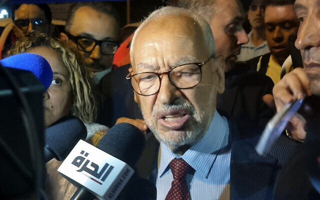 Leader of the Ennahdha party, Rached Ghannouchi, speaks to the media after he was freed by the Tunisia's anti-terrorism unit in Tunis, Tunisia, Tuesday, July 19, 2022 (AP Photo/Hassene Dridi, File)