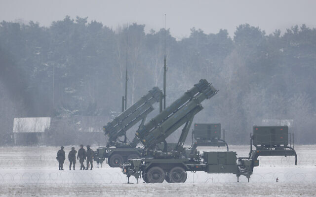 Patriot missile launchers acquired from the US are seen deployed in Warsaw, Poland, on February 6, 2023. (Michal Dyjuk/AP)