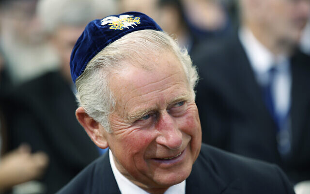 Britain's then-prince Charles wears a kippah during the funeral of Shimon Peres at Mt. Herzl Military Cemetery in Jerusalem, September 23, 2016. (Abir Sultan, Pool via AP, File)