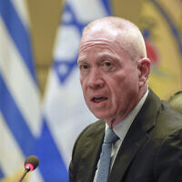 Defense Minister Yoav Gallant speaks during a meeting with his Greek counterpart Nikos Panagiotopoulos, in Athens, May 4, 2023. (AP Photo/Thanassis Stavrakis)