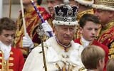 Britain's King Charles III departs Westminster Abbey after his coronation ceremony in London, May 6, 2023. (AP Photo/Alessandra Tarantino)