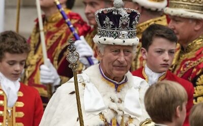 Britain's King Charles III departs Westminster Abbey after his coronation ceremony in London, May 6, 2023. (AP Photo/Alessandra Tarantino)
