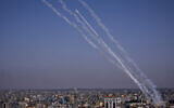 Rockets are launched from the Gaza Strip towards Israel, in Gaza, May 10, 2023. (AP Photo/Fatima Shbair)