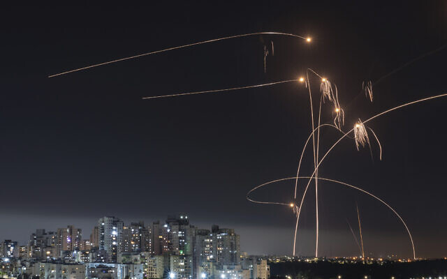 The Iron Dome missile defense system fires interceptors at rockets launched from the Gaza Strip, in Ashkelon, May 11, 2023. (AP Photo/Tsafrir Abayov)