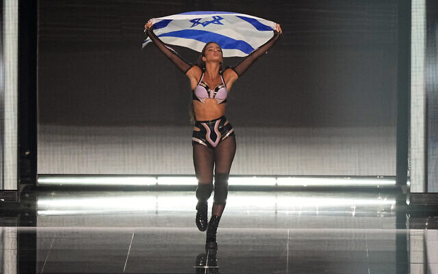 Noa Kirel of Israel during the flag ceremony before during the Grand Final of the Eurovision Song Contest in Liverpool, England, May 13, 2023. (AP Photo/Martin Meissner)