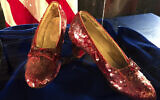 File: A pair of ruby slippers once worn by actress Judy Garland in the "The Wizard of Oz" sit on display at a news conference at the FBI office in Brooklyn Center, Minnesota, September 4, 2018. (AP Photo/Jeff Baenen)