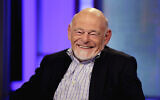 Sam Zell, chairman of Equity Group Investments, and chairman of Equity International, smiles during an interview by Neil Cavuto, on the Fox Business Network, in New York, on Aug. 6, 2013. (AP Photo/Richard Drew, File)
