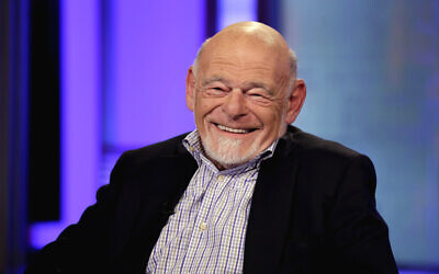 Sam Zell, chairman of Equity Group Investments, and chairman of Equity International, smiles during an interview by Neil Cavuto, on the Fox Business Network, in New York, on Aug. 6, 2013. (AP Photo/Richard Drew, File)