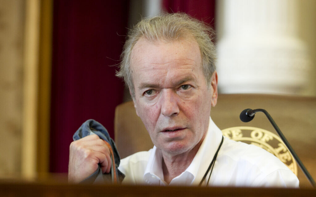 File: Author Martin Amis prepares to give a speech at the Texas Book Festival at the Capitol in Austin, Texas, on Saturday, Oct. 25, 2014. (Jay Janner/Austin American-Statesman via AP)
