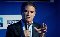 Former Mossad chief Yossi Cohen speaks at a conference of the Makor Rishon newspaper at the International Convention Center in Jerusalem, February 21, 2022. (Yonatan Sindel/ Flash90/ File)