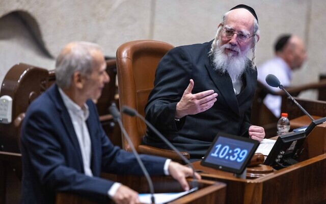 UTJ MK and Deputy Knesset Speaker Yisrael Eichler (right) during a vote in the Knesset, in Jerusalem, on December 28, 2022. (Olivier Fitoussi/Flash90)