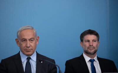Prime Minister Benjamin Netanyahu (left) and Finance Minister Bezalel Smotrich during a press conference, at the Prime Minister's Office in Jerusalem, on April 30, 2023. (Alex Kolomoisky/Pool)