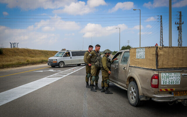Israeli soldiers block a road near the border with Gaza, southern Israel, on May 9, 2023. Photo by  (Flash90)