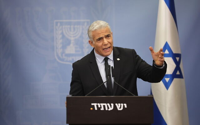 Opposition Leader Yair Lapid speaks during a Yesh Atid faction meeting at the Knesset in Jerusalem, May 15, 2023. (Yonatan Sindel/Flash90)