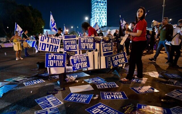 Protesters march in Bnei Brak against the billions in funds provided to ultra-Orthodox parties in the state budget, on May 17, 2023.  (Avshalom Sassoni/Flash90)