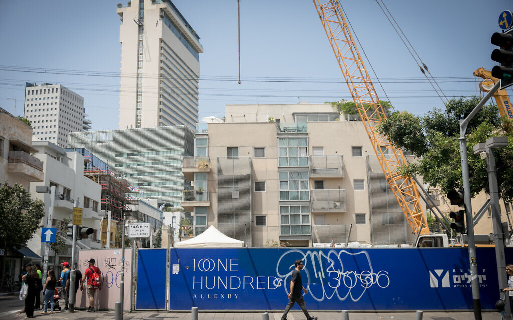 Illustrative: Construction of new residential buildings on Allenby Street in Tel Aviv, May 21, 2023. (Miriam Alster/Flash90)