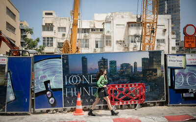 Construction of new residential buildings on Allenby Street in Tel Aviv, May 21, 2023. (Miriam Alster/FLASH90)