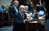 Prime Minister Benjamin Netanyahu adresses the Knesset during a debate about the soaring homicide rate on May 29, 2023. (Yonatan Sindel/Flash90)