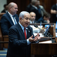 Prime Minister Benjamin Netanyahu addresses the Knesset during a debate, in Jerusalem, on May 29, 2023. (Yonatan Sindel/Flash90)