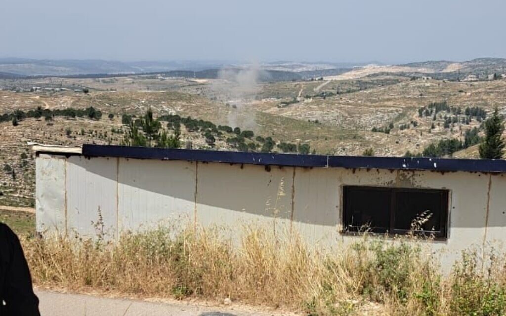 Smoke is seen from the West Bank settlement of Bat Ayin after Palestinian terrorists in the Gaza Strip fired rockets at Israel, May 12, 2023. (Courtesy)