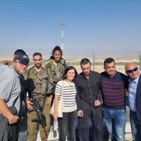 Shalom Rotban (third from right) with his family at the Israeli-Jordanian border on May 25, 2023. (Israel Dog Unit Spokesperson; used in accordance with Clause 27a of the Copyright Law)