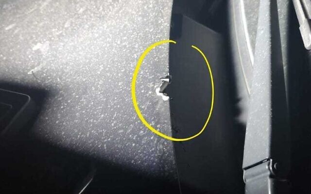 A handout photo from the Samaria Regional Council shows a bullet hole in an Israeli car that was struck in a shooting attack in the northern West Bank, May 22, 2023. (Samaria Regional Council)