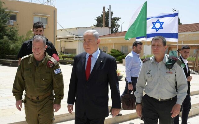Prime Minister Benjamin Netanyahu visits an IDF intelligence base on May 23, 2023 (Amos Ben Gershom/GPO)