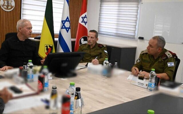 Defense Minister Yoav Gallant meets with IDF commanders at the Gaza Division on May 23, 2023. (Ariel Hermon/Defense Ministry)