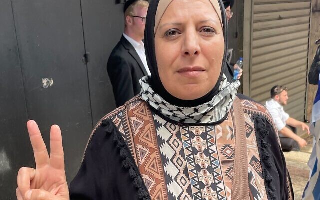 Muna Barbar, a Palestinian woman from the East Jerusalem neighborhood of Silwan, visits the Muslim Quarter of the Old City of Jerusalem on May 18, 2023. (Jeremy Sharon/Times of Israel)