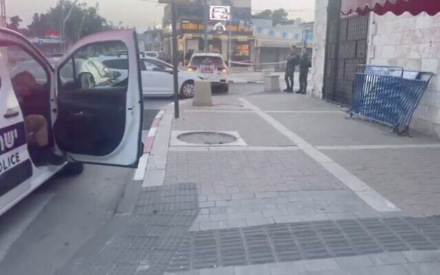 Screen capture from video of the scene where a man was shot dead in Lod, May 17, 2023. (Israel Police)
