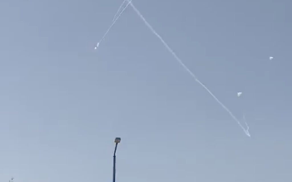 Iron Dome missiles intercept rockets fired by terrorists in the Gaza Strip, over the southern town of Sderot, May 12, 2023. (Screenshot: Twitter; used in accordance with Clause 27a of the Copyright Law)
