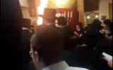 The bonfire lit inside Beis Midrash Beis Shmuel synagogue in London, England last week (Screenshot via Jewish News UK used in accordance with Clause 27a of the Copyright Law).