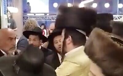 Ultra-Orthodox men protest against an indoor play center in the northern town of Harish for operating on Shabbat, May 20, 2023. (Screenshot: Twitter; used in accordance with Clause 27a of the Copyright Law)