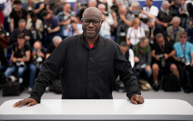 Steve McQueen poses for photographers at the photo call for the film 'Occupied City' at the 76th international film festival, Cannes, southern France, May 18, 2023. (AP Photo/Daniel Cole)