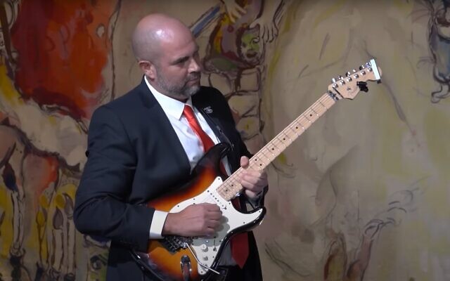 Knesset Speaker Amir Ohana plays Hotel California during a reception at the Knesset in Jerusalem for US House Speaker Kevin McCarthy, April 30, 2023. (Screenshot: YouTube; used in accordance with Clause 27a of the Copyright Law)