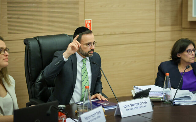 Knesset Health Committee chair MK Uriel Busso makes a point during deliberations over health insurance reform on May 14, 2023. (Noam Moshkovitz/Knesset Spokesperson's Office)