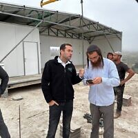 Head of the Samaria Regional Council Yossi Dagan (right) visits the new yeshiva in Homesh, May 29, 2023. (Roi Hadi)