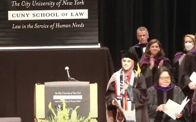 Fatima Mohammed acknowledges the crowd after speaking at CUNY School of Law on May 12 (Youtube screenshot; used in accordance with clause 27a of the copyright law)