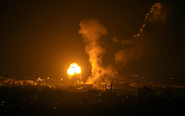 Fire and smoke rise following an Israeli airstrike in northern Gaza, May 2, 2023. (AP Photo/Fatima Shbair)