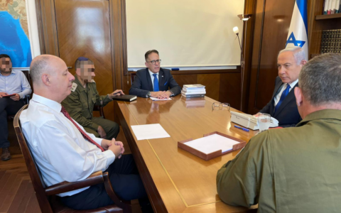 Prime Minister Benjamin Netanyahu, right, holds a situation assessment with National Security Adviser Tzachi Hanegbi, left, Chief of Staff Tzachi Braverman, and Military Secretary Avi Gil at the Prime Minister's Office in Jerusalem on May 11, 2023 (Courtesy)