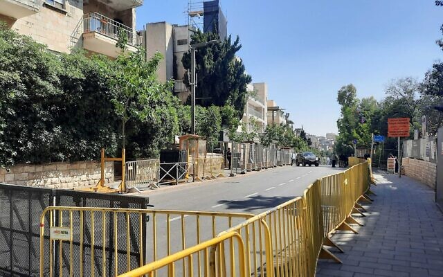 Barricades are seen near Prime Minister Benjamin Netanyahu's apartment on Azza Street in Jerusalem, June 14, 2023. (Amy Spiro/Times of Israel)