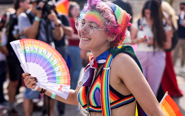 A participant at the 21st annual Jerusalem Pride Parade on June 1, 2023. (Menahem Kahana / AFP)