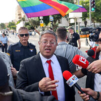National Security Minister Itamar Ben-Gvir speaks to the press as he visits the annual Jerusalem Pride Parade and the protest against it, in Jerusalem on June 1, 2023. (Photo by Menahem KAHANA / AFP)