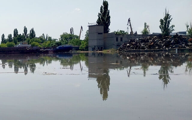 This general view shows a partially flooded area of Kherson on June 6, 2023, following damage sustained at Kakhovka hydroelectric dam. (Sergiy Dollar / AFP)