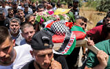 Mourners carry the body of 2.5-year-old Mohammed Haitham al-Tamimi during his funeral in the village of Nabi Saleh in the West Bank, June 6, 2023. (AHMAD GHARABLI / AFP)