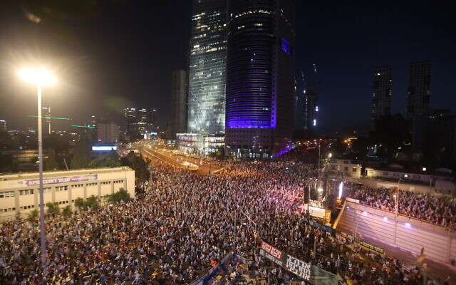 Demonstrators rally to protest the Israeli government's judicial overhaul in Tel Aviv on June 10, 2023. (Jack Guez/AFP)