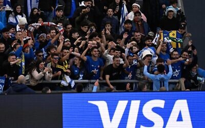 Israel's forward Hamza Shibli celebrates with fans after defeating South Korea and achieving the third place in the Argentina 2023 U-20 World Cup at the Estadio Unico Diego Armando Maradona stadium in La Plata, Argentina, on June 11, 2023. (Luis ROBAYO / AFP)