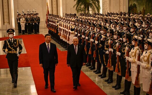 China's President Xi Jinping and Palestinian President Mahmoud Abbas attend a welcoming ceremony at the Great Hall of the People in Beijing on June 14, 2023. (Jade GAO / POOL / AFP)