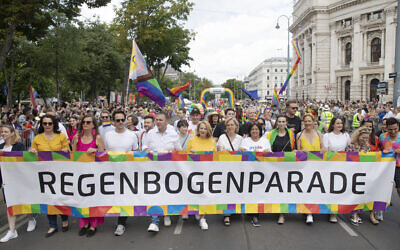 Politicians of Austria's Social Democratic Party (SPOe) and Greens carry a banner with "Regenbogenparade" (Pride Parade) at Ringstrasse in Vienna, Austria, on June 17, 2023. (Alex HALADA/AFP)