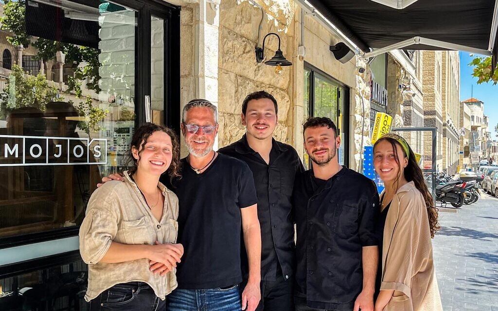 Tzvi Maller, second from left, Jerusalem restaurateur with four of his kids, Eden (far right), Meir, Levav and Tanya who work with him at Mojo's, his new upscale pizzeria (Courtesy Mojo's)
